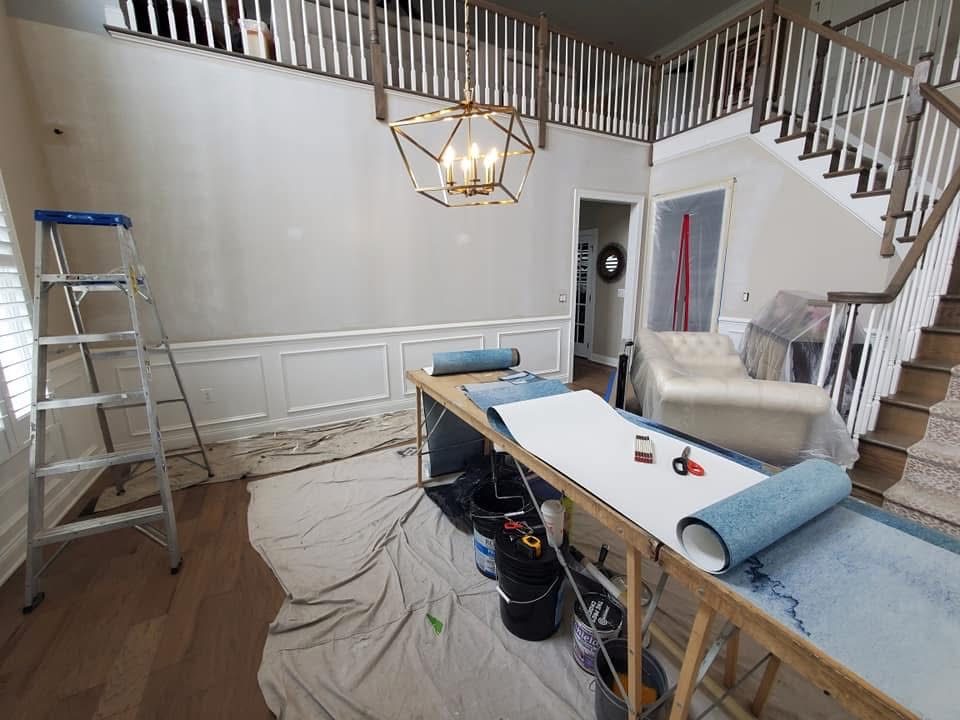 Room being prepared for wallpaper installation